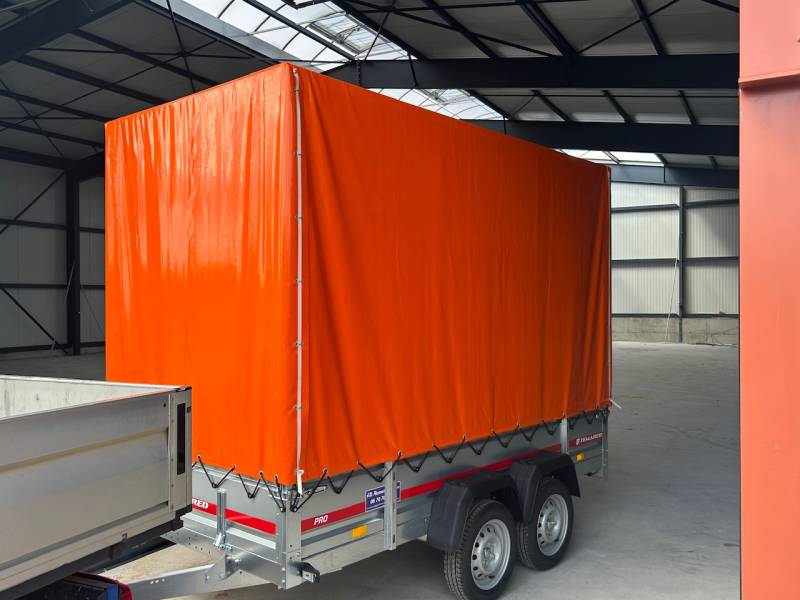 Remorque spéciale 300x150x210 cm avec réhausses grillagée et bâche orange