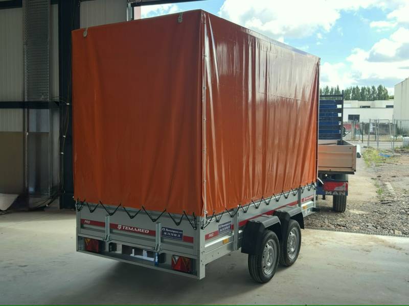 Remorque spéciale 300x150x210 cm avec réhausses grillagée et bâche orange