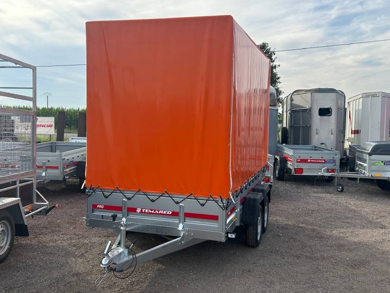 Remorque spéciale 300x150x210 cm avec réhausses grillagée et bâche orange